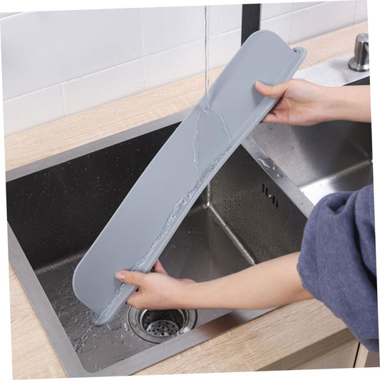 Silicone sink splash guard by fusiongadgetspk preventing water splashes around kitchen sink.