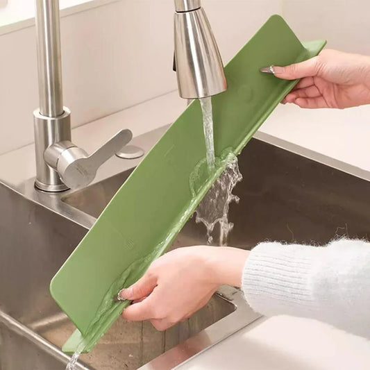 Silicone sink splash guard by fusiongadgetspk preventing water splashes around kitchen sink, flexible and easy to install.